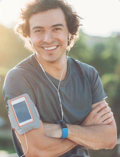 a fashionable man using wearable technology